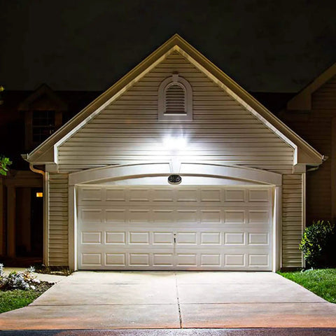 Exterior of house illuminated by 2 Pack Outdoor LED Flood Light Bulbs PAR38 3000 Lumen 25W 300W Equivalent Waterproof Dimmable Spotlight