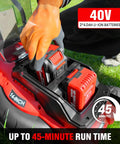 Person inserting batteries into Cordless 40V Lawn Mower With Dual 4.0Ah Batteries, 14 Inch Push Mower, showing battery compartment.