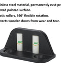 Barn Door Floor Guide Set With Bearing Design And Adjustable Rollers Durable Stainless Steel Frame Quiet Operation And Scratch Free Movement For Sliding Doors 360 Degree Wheel Rollers For Smooth Low Noise Performance, showing black floor guide with white 360° rollers.