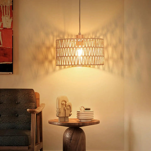 Handcrafted Boho Plug In Pendant Light With Artisan Woven Shade, Easy Three Way Switch, Extended Cord For Serious Chill Living Room Aura And Definitely Solid Decor Flex Year Round hanging above a wooden table.