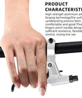 Universal 22mm Bike Brake Levers Set installed on handlebars, showing ergonomic design and aluminum construction with hand in grip.