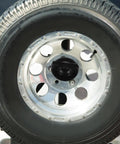 Spare Tire Bolt Retainer Clamp For CRV Durable Car Wheel Accessory shown on a metallic car wheel.