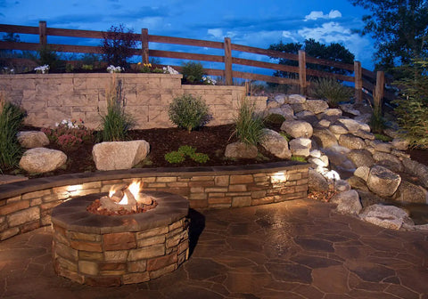 Night view of garden with 12 Inch LED Hardscape Lighting Kit for Paver Walls and Steps Low Voltage 12V AC DC 22 LED Chips for Even Warm White Glow 2700K