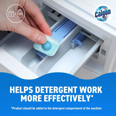 Straight Up Heavy Duty Washing Machine Cleaner And Water Softener Tablets in hand above detergent compartment.