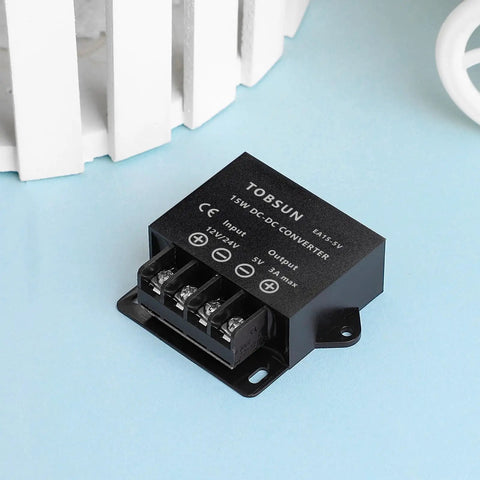 Input Range 12V To 24V To 5V 3A 15W DC Power Converter For Cars And Electronics shown on a blue surface