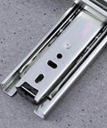 Heavy Duty Telescopic Drawer Slides Featuring Premium Steel Ball Bearings For Slick Smooth Operation Built Tough For Quiet Undermount Cabinet Gliding Real Easy Install close-up of steel glide mechanism