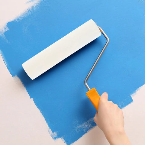 Heavy Duty High Density Polyurethane Sponge Paint Roller Set For Wall Painting And Housekeeping Or Auto Detailing Smooth As Silk Finish Guaranteed No Hassle. Hand applying blue paint with a white sponge roller.