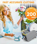 Automatic Tape Dispenser And Ribbon Cutting Machine Offering No Sweat Quick Precision Trimming Portability For Shipping Packing Schools And Retail Stores Smooth Manual Override With Lightweight Ergonomic Build Design in use by a florist cutting ribbon.