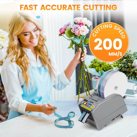 Automatic Tape Dispenser And Ribbon Cutting Machine Offering No Sweat Quick Precision Trimming Portability For Shipping Packing Schools And Retail Stores Smooth Manual Override With Lightweight Ergonomic Build Design in use by a florist cutting ribbon.