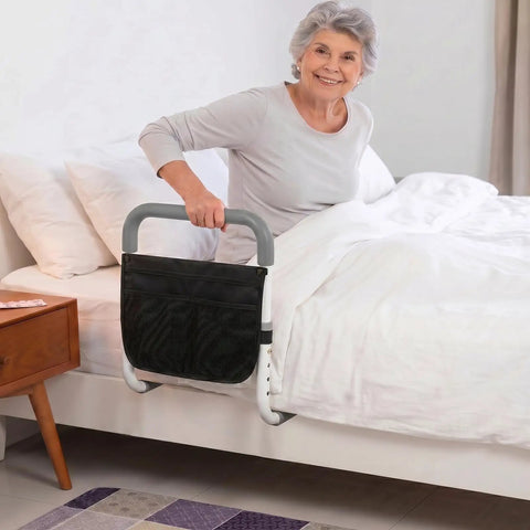 Woman using Heavy Duty Bed Rail For Seniors With Non Slip Foam Grip And Safety Strap ASTM Certified Bedside Guardrail Tool Free Install.