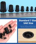 320 Piece Rivet Nuts Kit Flat Head Rivnut Inserts Black Zinc Plated Carbon Steel Assortment shown with ruler and hand for scale