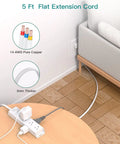 Ultra Slim Flat Plug Power Strip With Twelve Outlets And Three Sided Access Smooth Operator Five Foot Extension Cord on wooden floor