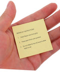 Hand holding repair instructions for Heavy Duty Repair Tape Patch Kit For Inflatable Tents Pools Air Mattresses And Vinyl Seals.