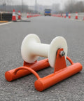 Heavy Duty Cable Guide Wheel For Straight Run Wiring Wire Pulley Roller With 200mm Wide Wheel Clamp And Cylindrical Pipe Socket For Electricians Pro Grade Conduit Routing Tool on asphalt