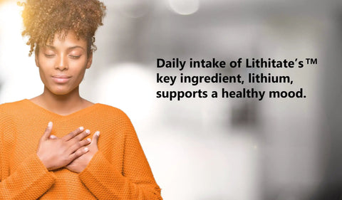 Woman holding hands to chest with text emphasizing mood support from Lithitate’s key ingredient, lithium.