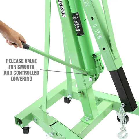 Close-up of Straight Shooter Two Ton Engine Hoist Foldable Cherry Picker shop crane release valve for controlled lowering.