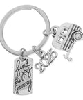 Lightweight Silver Zinc Alloy Travel Themed Keychain for Campers and RV Owners with charms 'find joy' and '2025'.