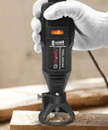 Front view of GOXAWEE rotary tool, black handheld drill with orange slider switch, used on wood with a clamp base.