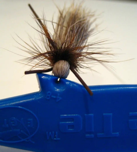 Eye Tie Fly Threader With Magnetic 3 Funnel System For Hook Sizes 3 To 24 securing a fly for easy tippet threading.