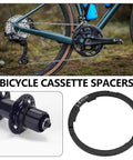 Two Pack Bike Flywheel Cassette Spacer 1.8mm Flywheel Gasket For Eight Nine Ten Eleven Speed Mountain Bikes Easy Install Tight Fit Reduces Shake 40.5 By 34.7 mm Black shown with bicycle and hub close-up