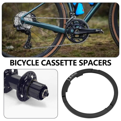 Two Pack Bike Flywheel Cassette Spacer 1.8mm Flywheel Gasket For Eight Nine Ten Eleven Speed Mountain Bikes Easy Install Tight Fit Reduces Shake 40.5 By 34.7 mm Black shown with bicycle and hub close-up
