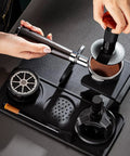 53mm Espresso Tamper Station With Spring Loaded Tamper And WDT Tool For Flawless Pulls in use, showcasing espresso preparation tools.