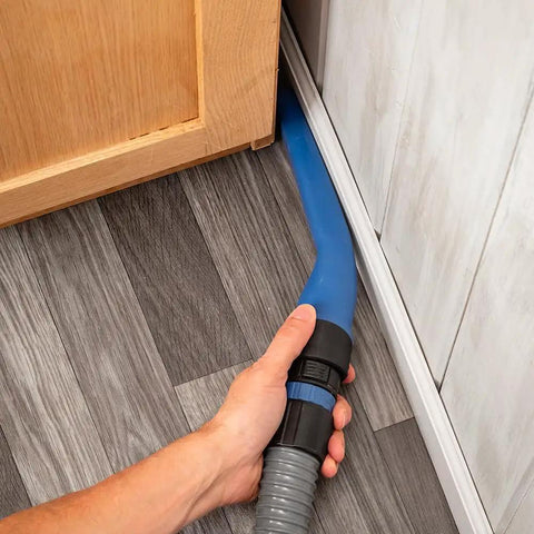 Hand using Flexible Click Connect Crevice Vacuum Attachment For Deep Cleaning In Tight Spaces Slim Extra Long Reach