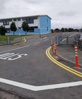 Heavy Duty Flexible Bollard Built Damn Tough For Busy Parking Lots Takes Serious Beating And Springs Back near school entrance.