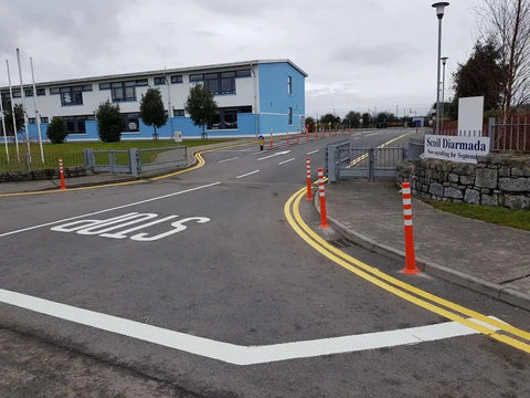 Heavy Duty Flexible Bollard Built Damn Tough For Busy Parking Lots Takes Serious Beating And Springs Back near school entrance.