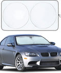 Heavy Duty Car Windshield Sun Shade Blocks Gnarly Highway Scorcher And Dangerous Ultraviolet Rays Keeps Your Ride Cooler on a car.