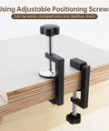 Badass 3 Inch C Clamps 4 Pack Heavy Duty Steel with Anti Slip Rubber Pads, adjusted to secure wood on a desktop stand.