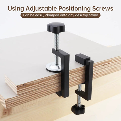 Badass 3 Inch C Clamps 4 Pack Heavy Duty Steel with Anti Slip Rubber Pads, adjusted to secure wood on a desktop stand.
