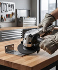 5 Inch Pneumatic Angle Grinder Featuring A Badass 11000 Rpm Motor used for cutting metal on a workbench with protective gloves.