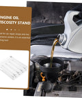 Engine Oil Quality Tester And Viscosity Comparator For Automotive Maintenance on auto repair stand with oil being poured into engine