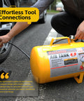 Portable Five Gallon Air Tank With Pressure Gauge And Safety Valve Lightweight Build With 40 Inch Hose For Easy Tool Connections Delivers Up To 140 PSI Great For DIY Projects At Home And On The Go being used to inflate car tire