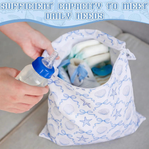 2 Pack Wet Bags Reusable Waterproof Wet Dry Bags For Travel Beach Pool Bathing Diapers Dirty Clothes Gym Gear With Zippered Pockets Sea Shell Blue And White Design 14.5 x 12.5 Inches Stroller Ready holding baby essentials.