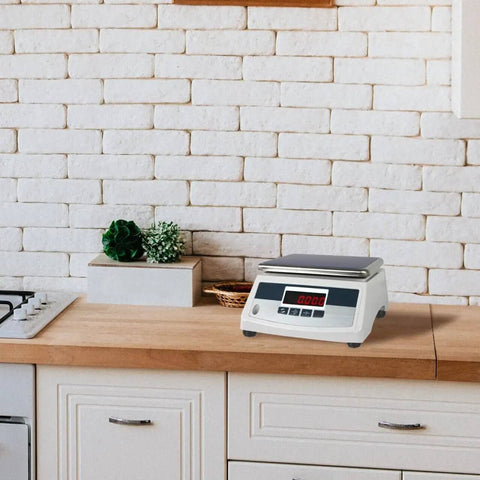 Electronic platform scale placed on a kitchen countertop with 4 Pack Replacement Scale Feet For Electronic Platform Scales With Shock Absorber Design.