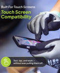 Cut Resistant Work Gloves 00-840 ANSI A4 Graphene Nitrile Coated in use, showing touchscreen compatibility while holding a smartphone.