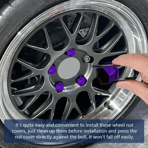 Glossy purple 20 Pack Lug Nut Covers 19mm Hex With Removal Tool fitted on vehicle wheel, showing installation process.