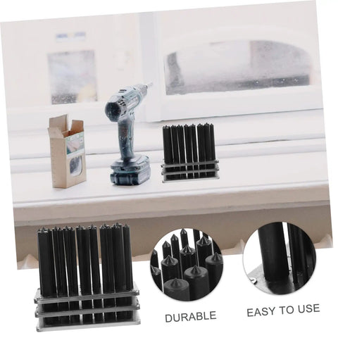 28-Piece Cylindrical Punch Set for Positioning Drilling and Mechanical Repairs displayed on windowsill with drill, punches, and base