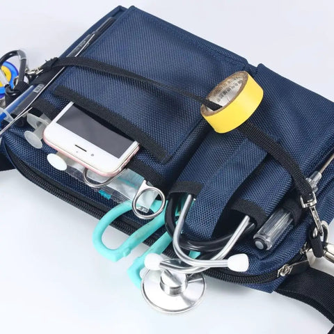 Heavy Duty Utility Waist Pack With Modular Tool Dividers And Waterproof Zippers For Job Site Hustlers Seeking Kick Ass Storage For Drill Bits Pliers And Pro Gear Built Tough As Nails Every Single Shift, featuring tools and phone.