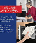 Elderly woman heating Arthritis Pain Relief Hand Warmer Gloves For Carpal Tunnel Support In Blue in microwave