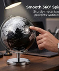 Person spinning 6 Inch World Globe With Antique Bronze Stand For Desktop Decor And Geography Learning Ideal For Home Office And Classroom Use Silver Finish