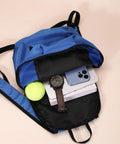 Ultra Light 12L Bike Backpack For Mountain Biking And All Day Adventures, Super Slim 134g Pack with open pocket showing contents