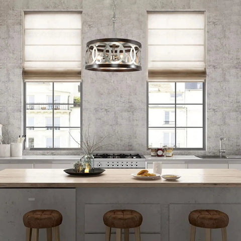 Three Light Wood Drum Chandelier In Brushed Nickel Finish With Dope Modern Farmhouse Vibe hanging in a kitchen setting.