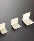 Set of three nylon hinges in small, medium, and large sizes, suitable for Six Piece Nylon Hinges Kit For RC Aircrafts Small To Large Easy Install For Aileron Rudder And Elevator Links Fixed Wing Models Pro Grade Foldable Durable Aircraft Hardware.