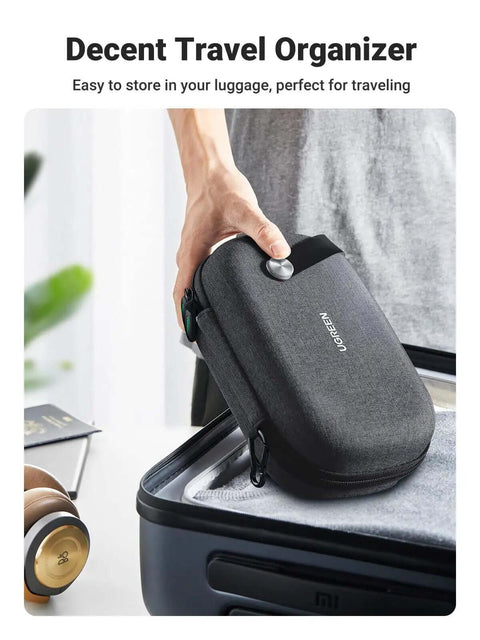 Built Like A Tank EVA Cable Organizer Travel Case Tangle Free Tech Gear Stash Pouch for Chargers Power Banks and USB Drives in use.