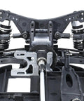 Close-up of One Tenth Scale 4x4 On Road RC Rolling Chassis Frame Kit For Adults showing suspension and wheelbase adjustments