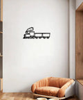 Dope Steam Locomotive Metal Wall Art For Living Room And Office, Vintage Rustic Train Silhouette Decor In Black Finish, Iron Wall Sculpture, 12 Inch Size hanging on a white wall above a beige chair.