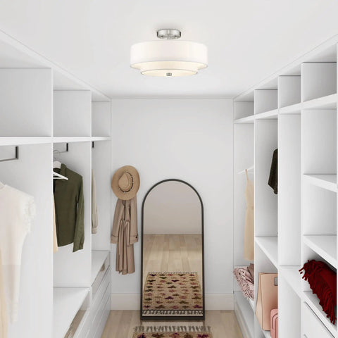 Brushed Nickel Flush Mount Ceiling Light With Off White Fabric Hardback Shade in a modern closet setting, transitional style.
